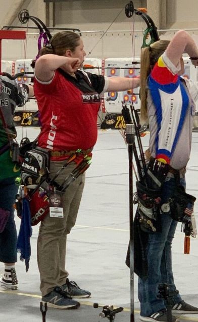 girl shooting an arrow